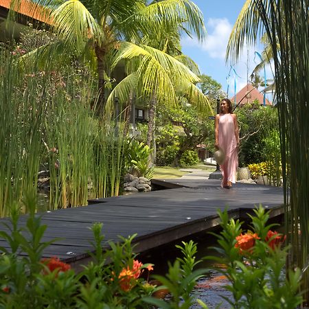 Bali Dynasty Resort Кута Екстер'єр фото The resort's gardens