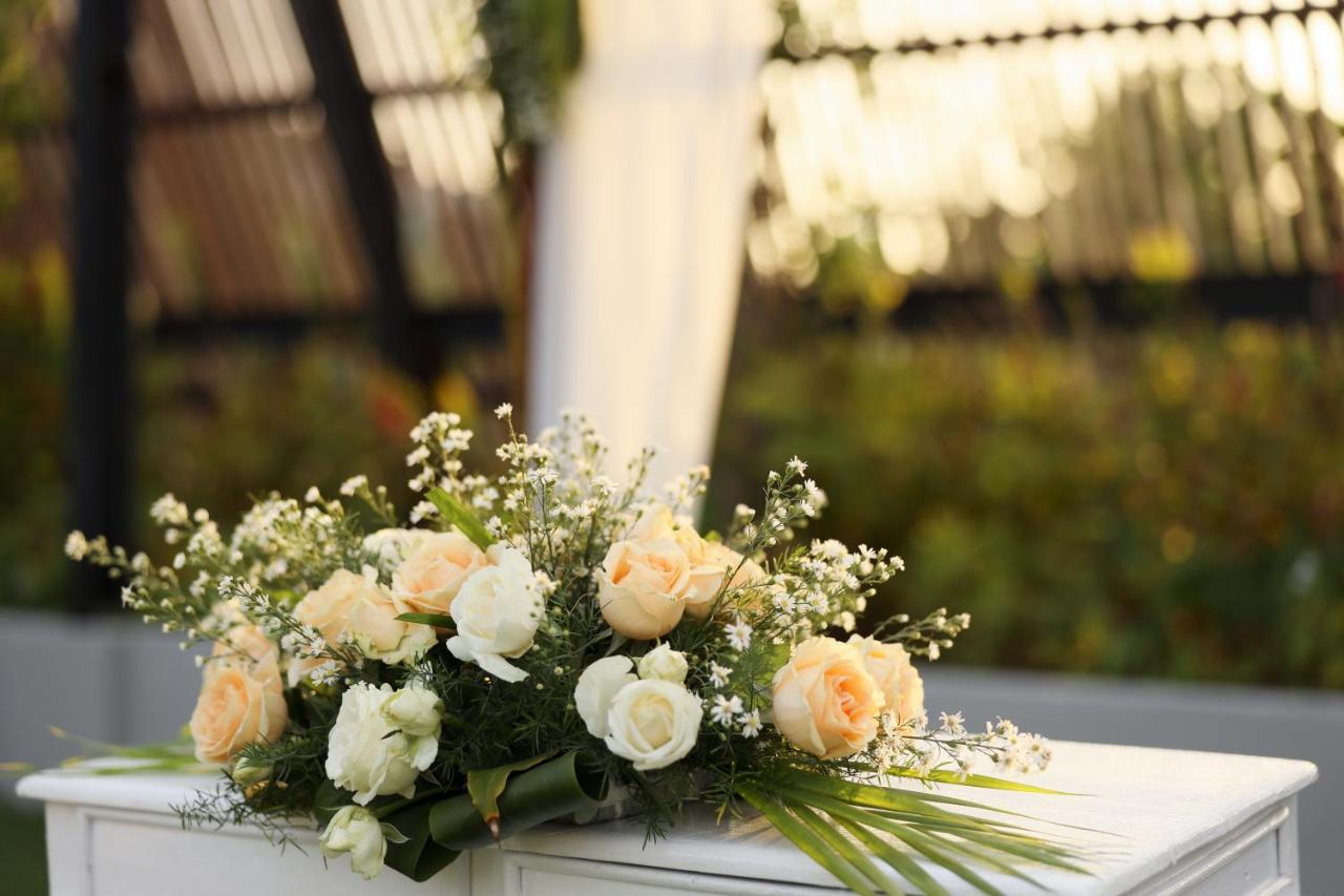 Bali Dynasty Resort Кута Екстер'єр фото A flower arrangement