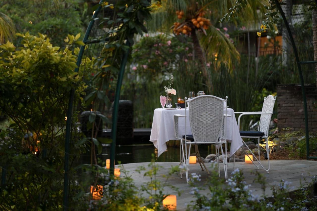 Bali Dynasty Resort Кута Екстер'єр фото The garden at the hotel